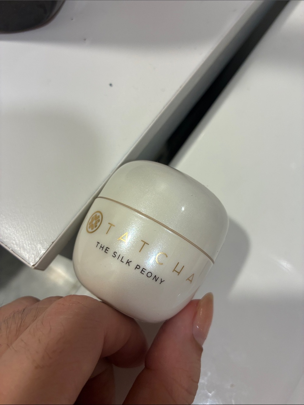 Tatcha The Silk Peony Moisturizer — Pearl White and Gold Accents
